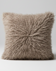 Fluffy brown pillow on a white background